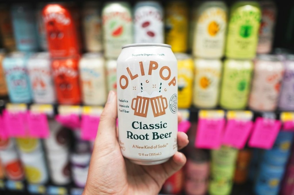 Olipop vs Poppi: Best Prebiotic Soda Gut Health | Ingredients & Sweetness (2026)